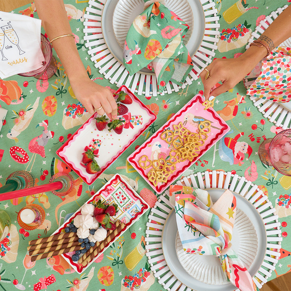 holiday green - tablecloth - napkins - christmas ceramics - confetti - pavlova